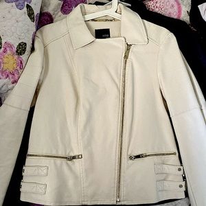 In great condition! Perfect for a night out and great for chilly weather!